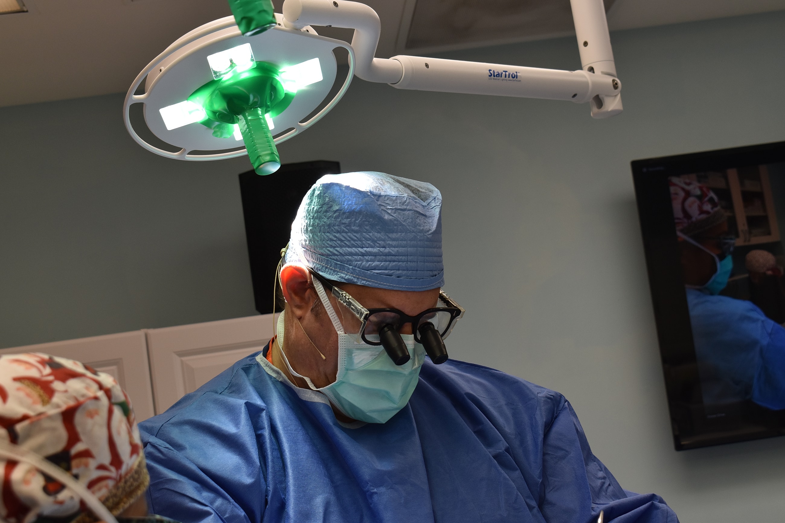 Aerial view of beach with umbrellas and crystal water.